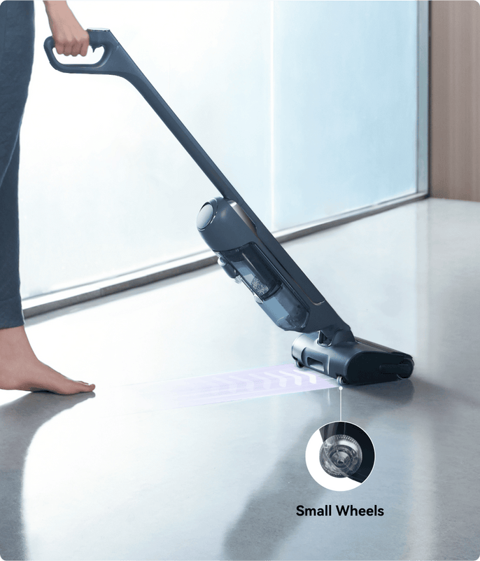 The woman is cleaning the floor with narwal s20pro robot vacuum.