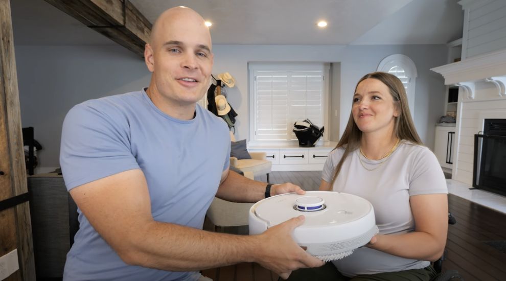 There are two persons talking about Narwal robot vacuum.