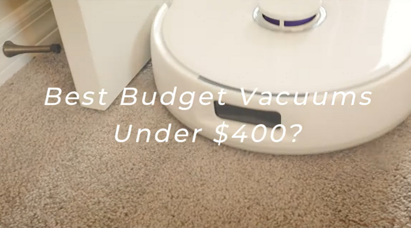 Narwal Freo X Plus robot vacuum cleaning carpet, with overlay text 'Best Budget Vacuums Under $400?