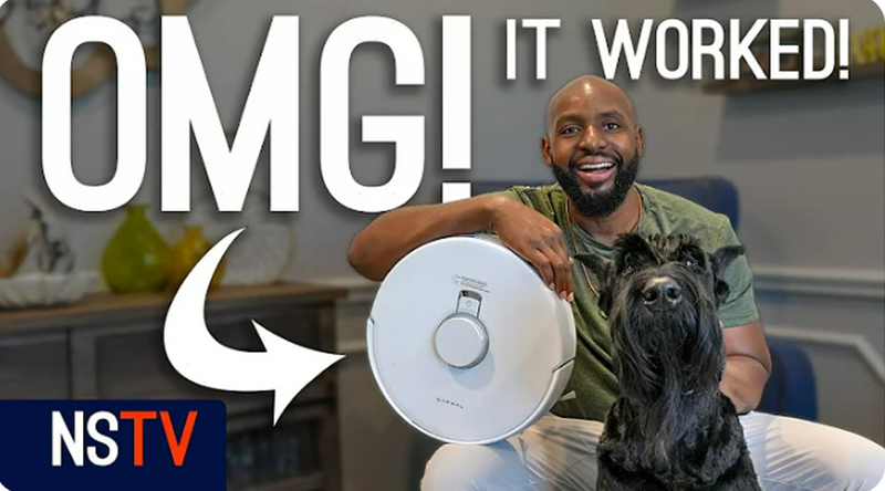 Happy man celebrating with Narwal Freo X Plus robot vacuum and his dog after successful cleaning, with text 'OMG! It worked!